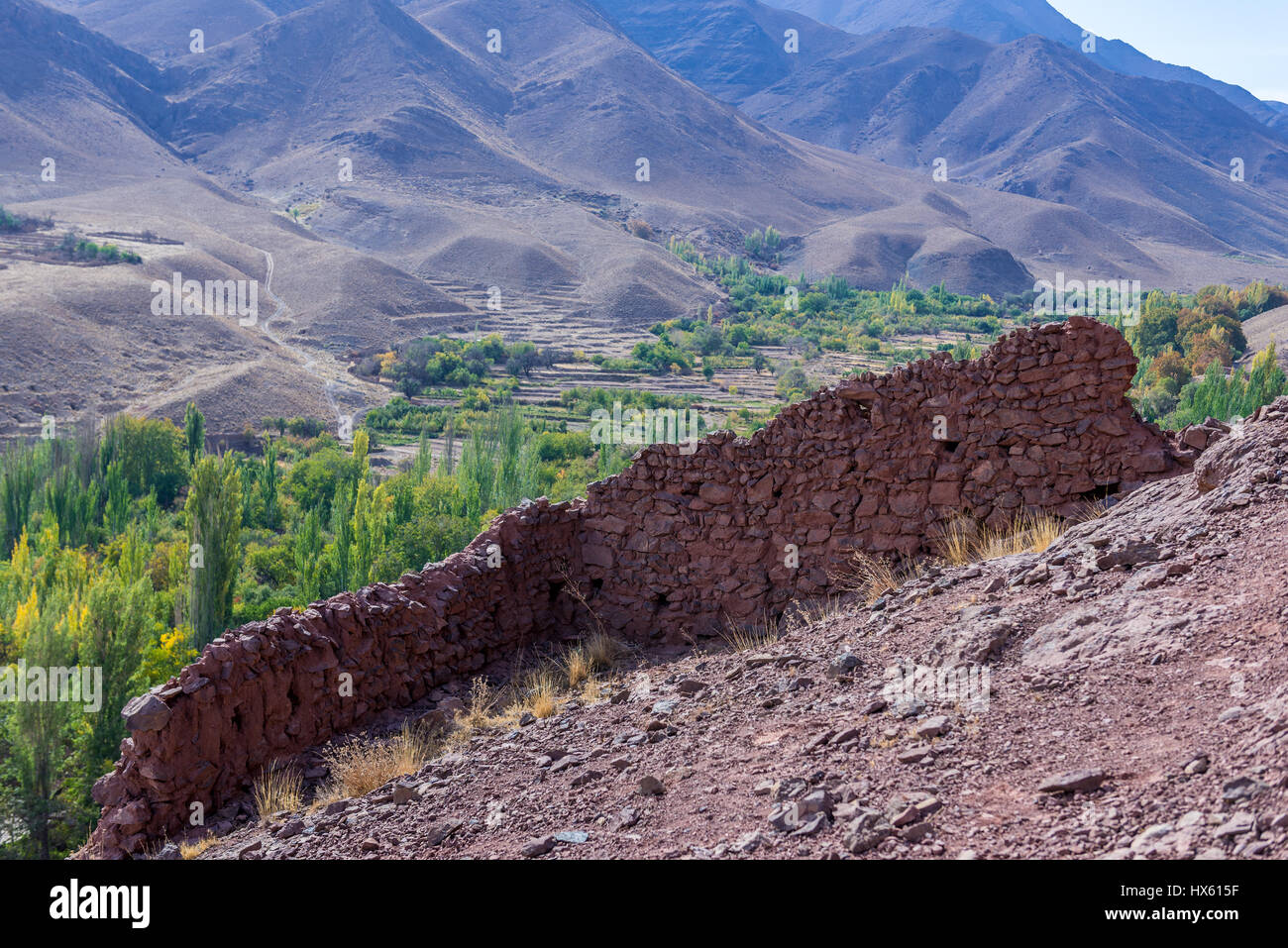 Sasanian Empire ruins on te hills over famous red village Abyaneh in Natanz County, Isfahan Province, Iran Stock Photo
