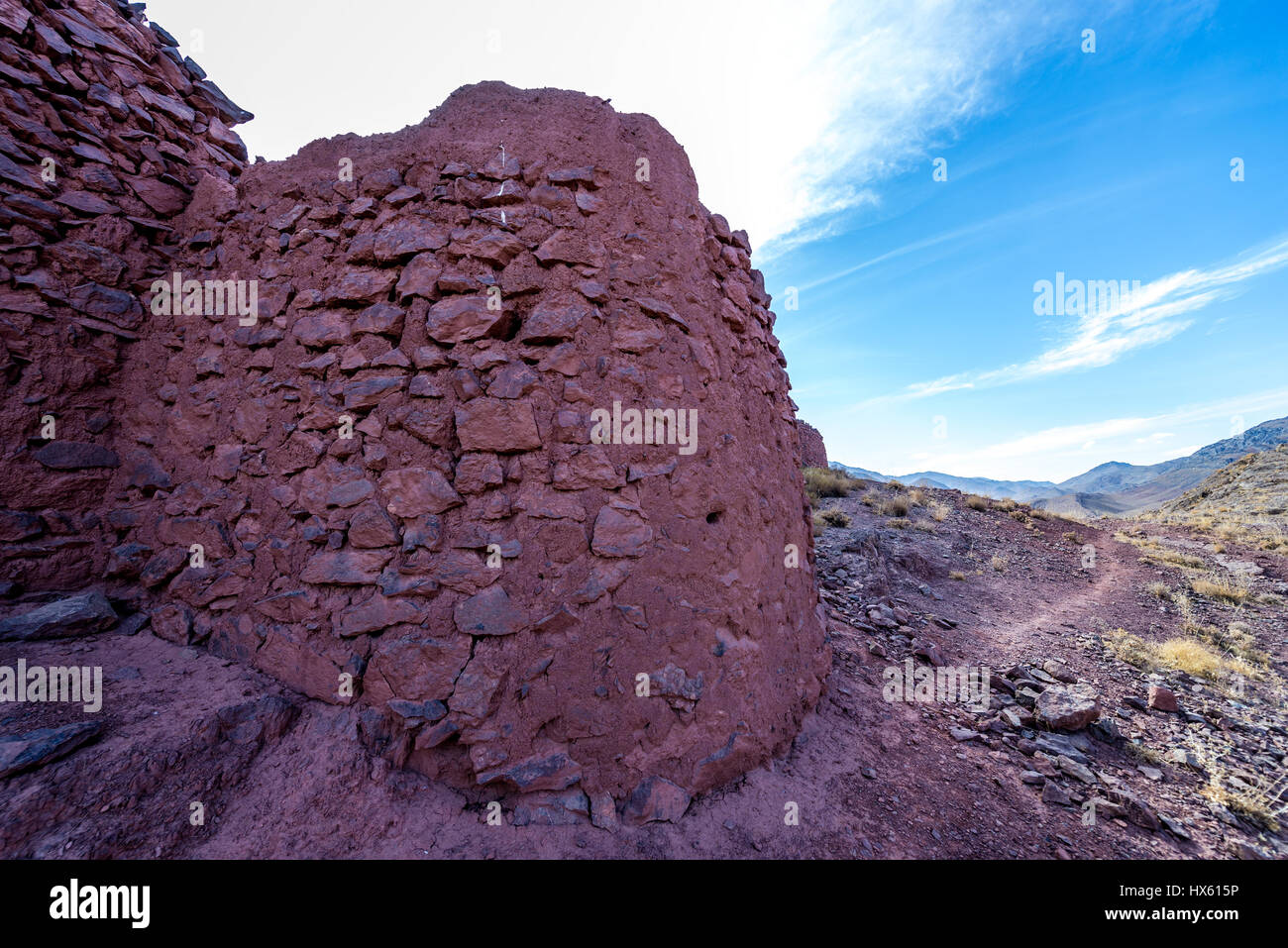 Sasanian Empire ruins on te hills over famous red village Abyaneh in Natanz County, Isfahan Province, Iran Stock Photo
