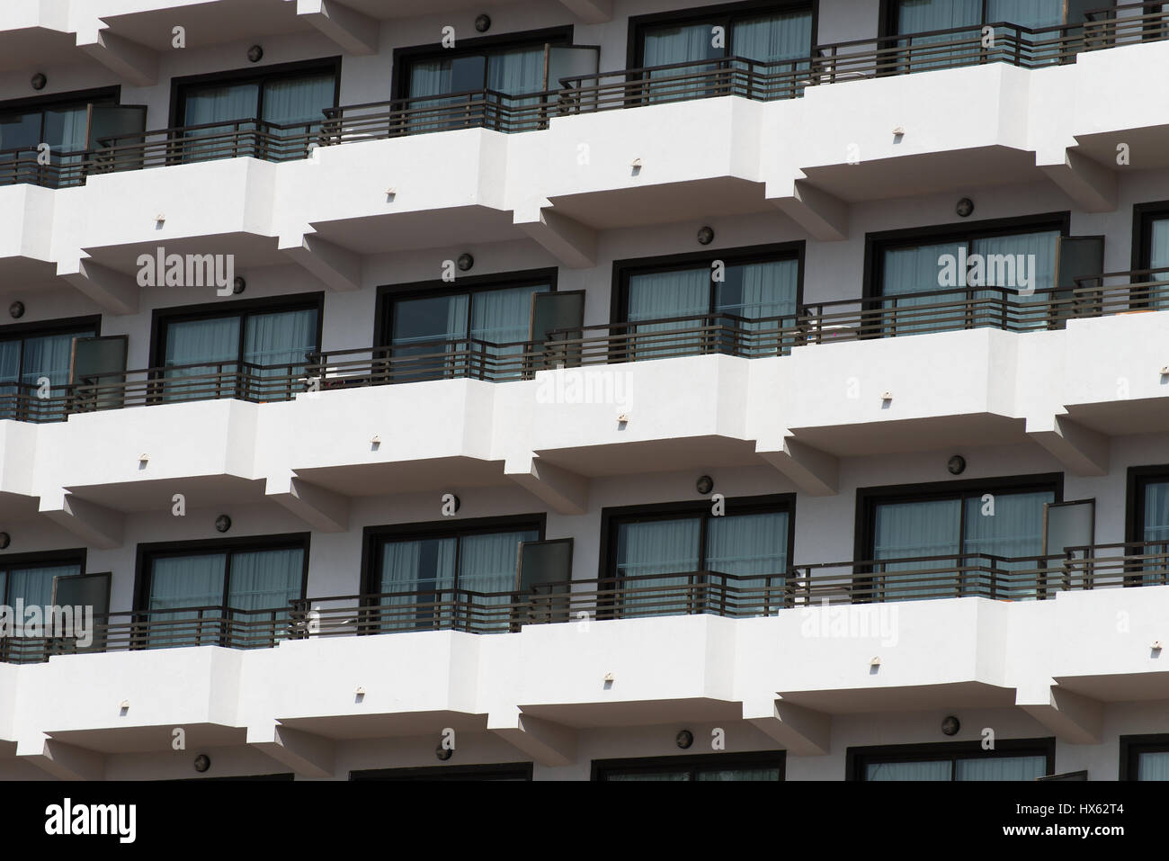 Portrait of apartment building with balconies Stock Photo - Alamy