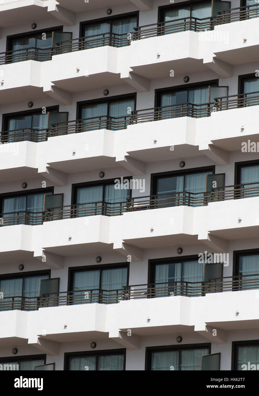 Portrait of apartment building with balconies Stock Photo - Alamy
