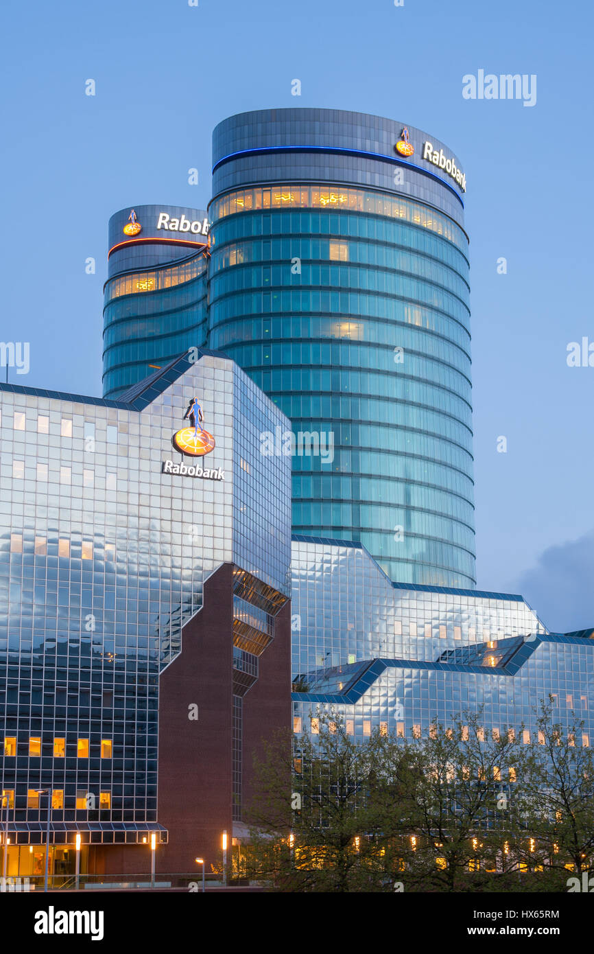 Rabobank headquarters building with glass reflecting the blue sky ...