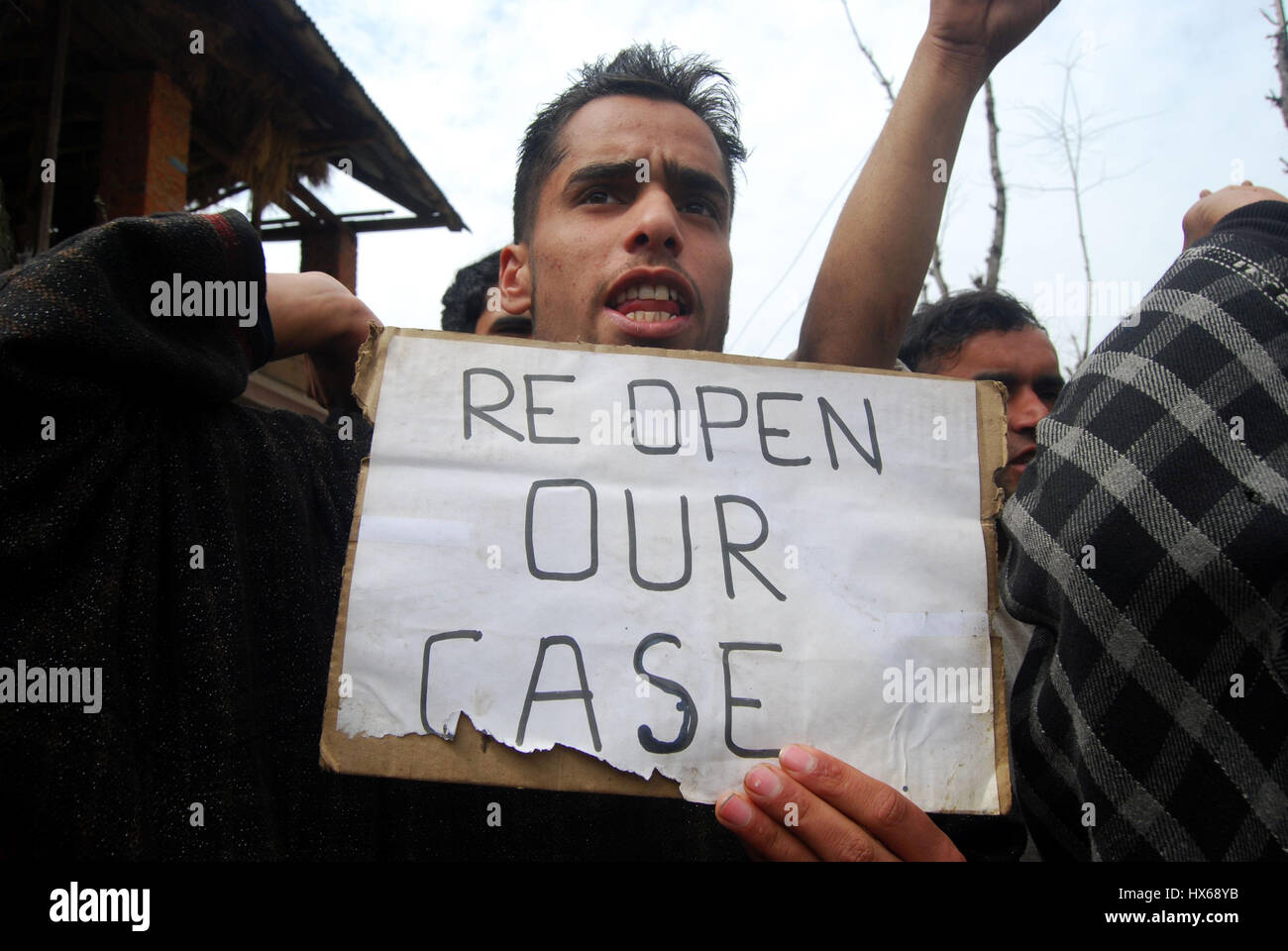 Carrying placards and banners reading ‘Reopen the Pathribal fake ...