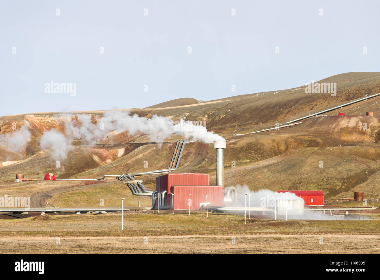 Krafla geothermal power plant with steam coming out of the chimney, Iceland Stock Photo