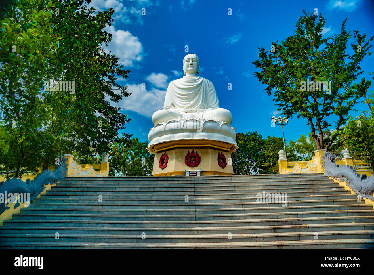 Statue of the Buddha against the blue sky Stock Photo - Alamy