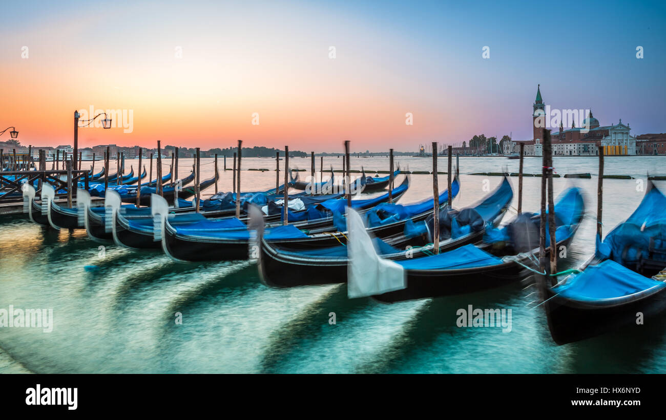 Stunning sunrise in Venice with gondolas, Italy Stock Photo - Alamy
