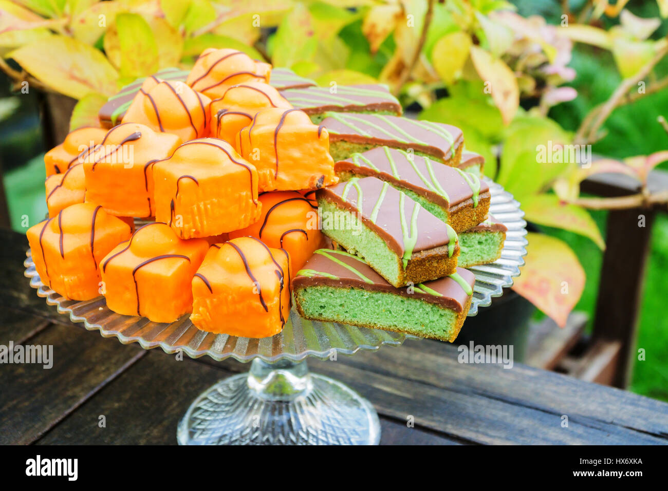 Cakes on a display stand outdoors Stock Photo Alamy