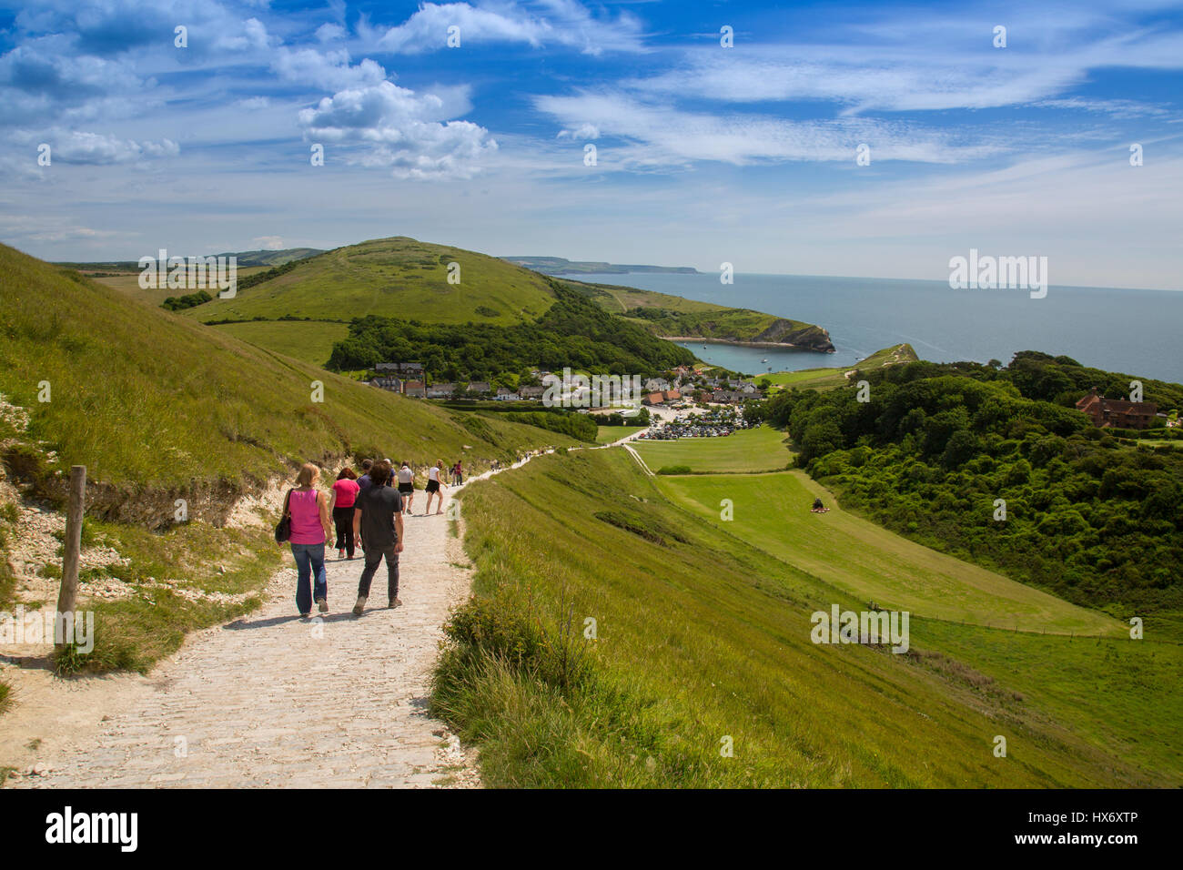 Approaching Lulworth Cove from the long distance South West Coast Path on the Jurassic Coast, Dorset, England Stock Photo