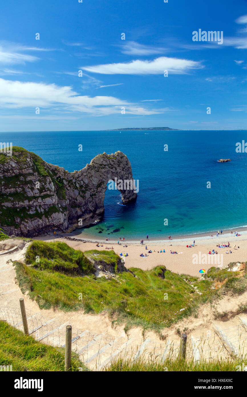 The natural limestone arch known as Durdle Door viewed from the long distance South West Coast Path on the Jurassic Coast, Dorset, England Stock Photo