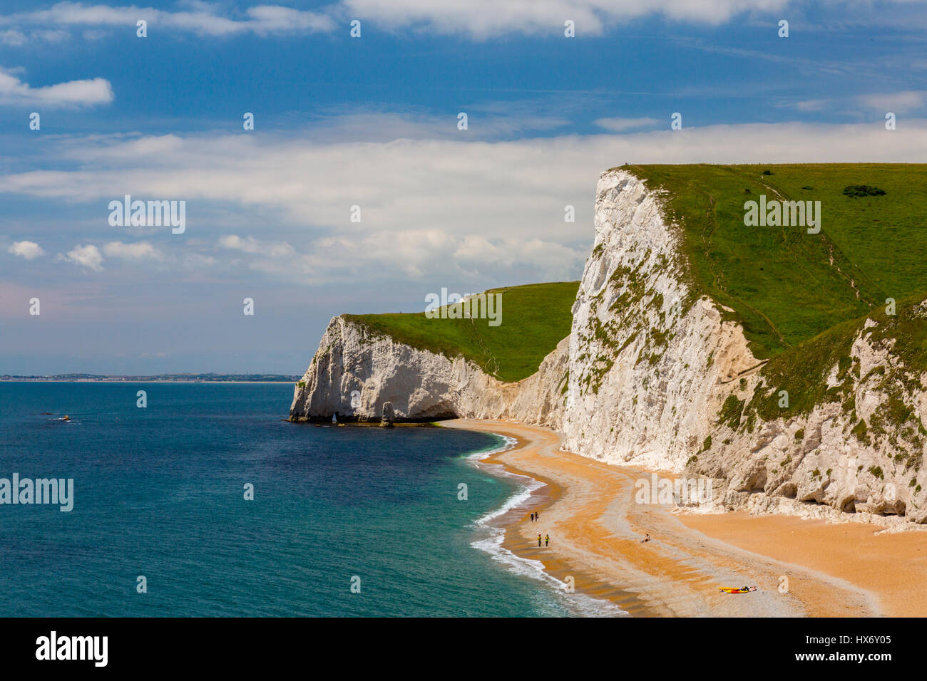Looking west from Durdle Door towards the chalk cliffs of Swyre Head and Bat Head on the Jurassic Coast, Dorset, England Stock Photo