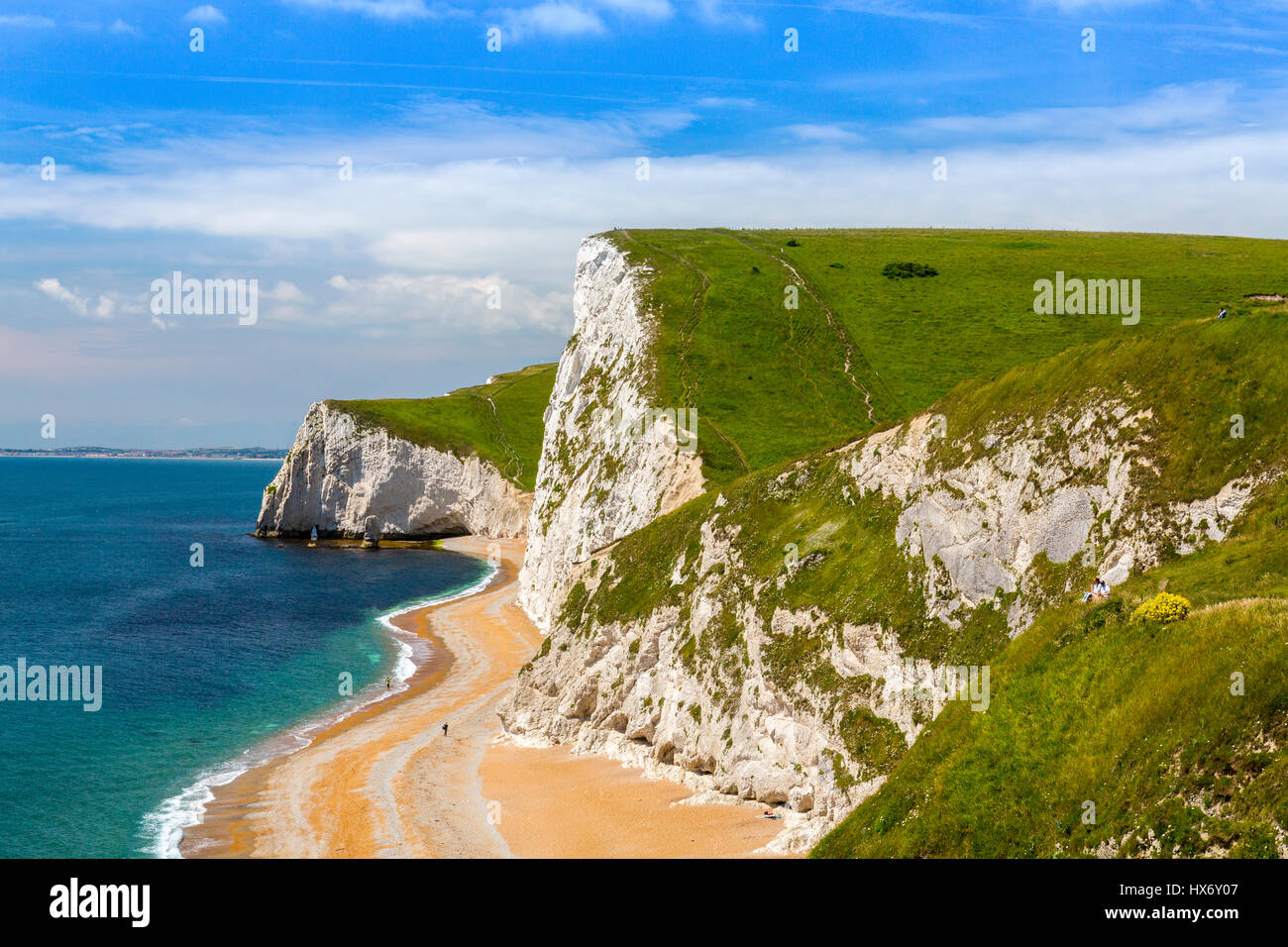 Looking west from Durdle Door towards the chalk cliffs of Swyre Head and Bat Head on the Jurassic Coast, Dorset, England Stock Photo