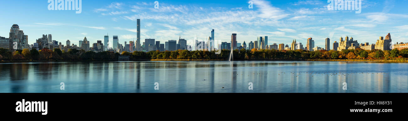 Morning panoramic view of Midtown Manhattan skyscrapers and the Central Park Reservoir in Fall. New York City Stock Photo