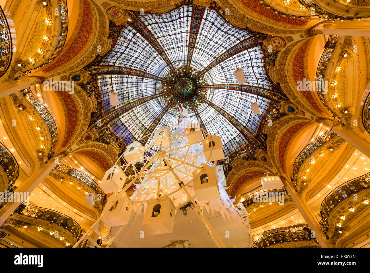 Galleries Lafayette Haussman interior with glass cupola at Christmas. Paris, France Stock Photo