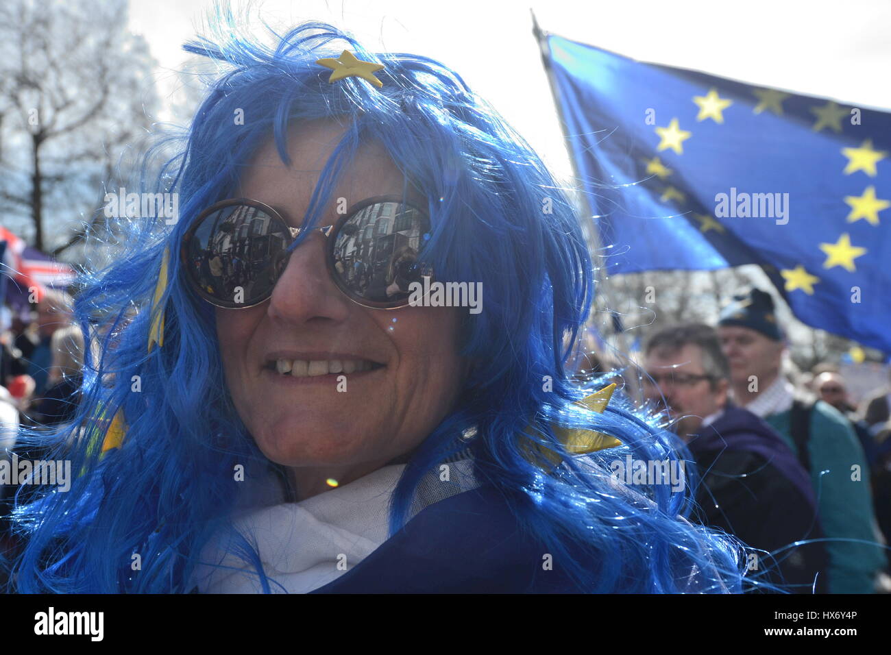 A pro-EU protester taking part in a March for Europe rally against Brexit in central London wears a blue wig with stars symbolising the European Union. Stock Photo