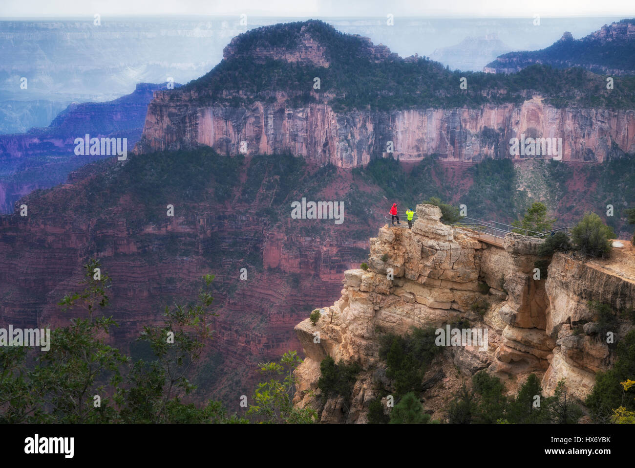 Tourists viewing Grand Canyon from Bright Angels Point. Grand Canyon National Park, Arizona Stock Photo
