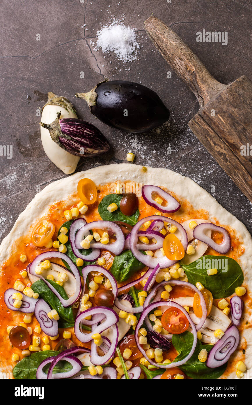 Raw Pizza Dough and Rolling Pin with Ingredients. Italian Pizza Making