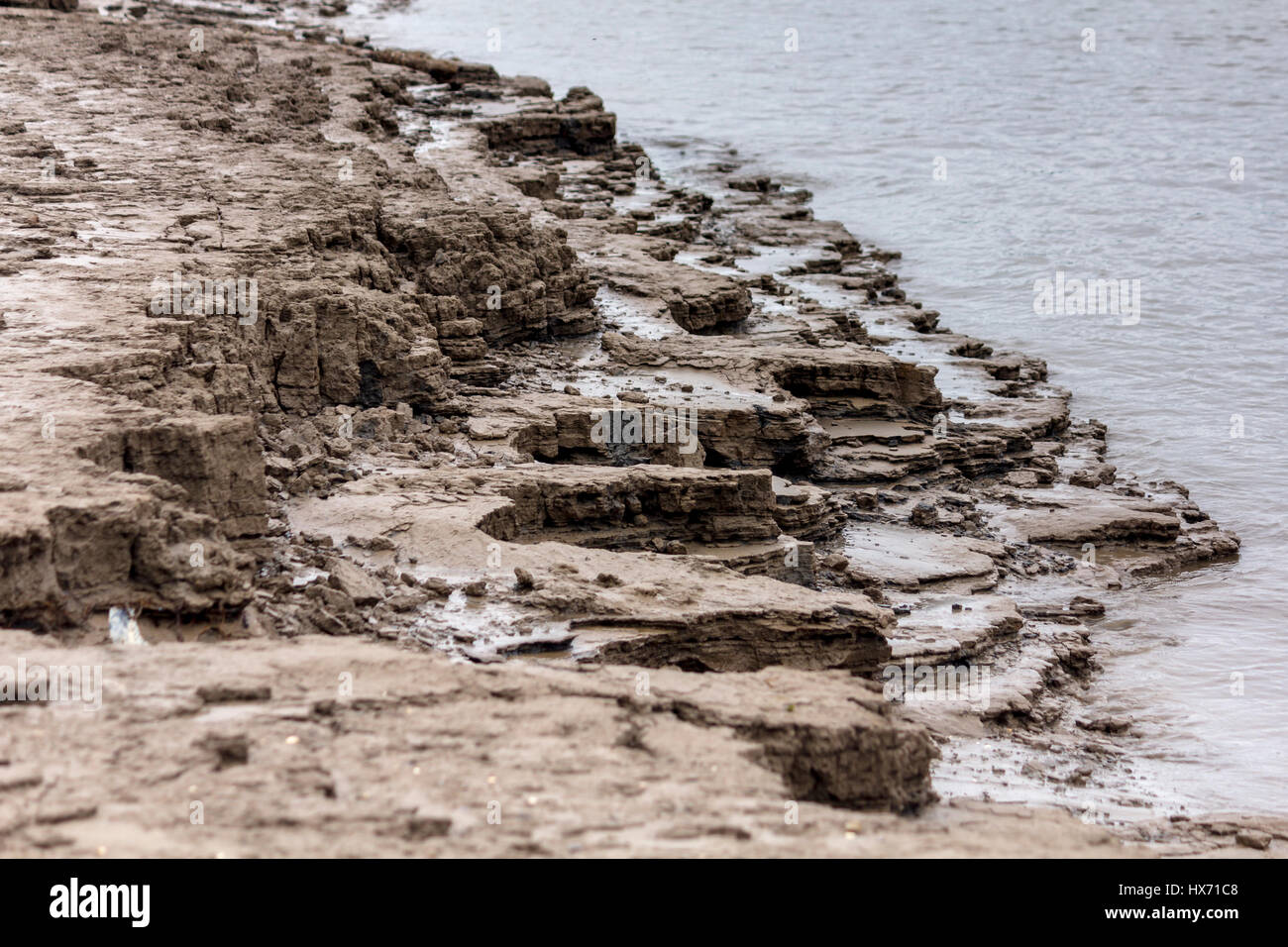 Eroding Mud River Bank Stock Photo