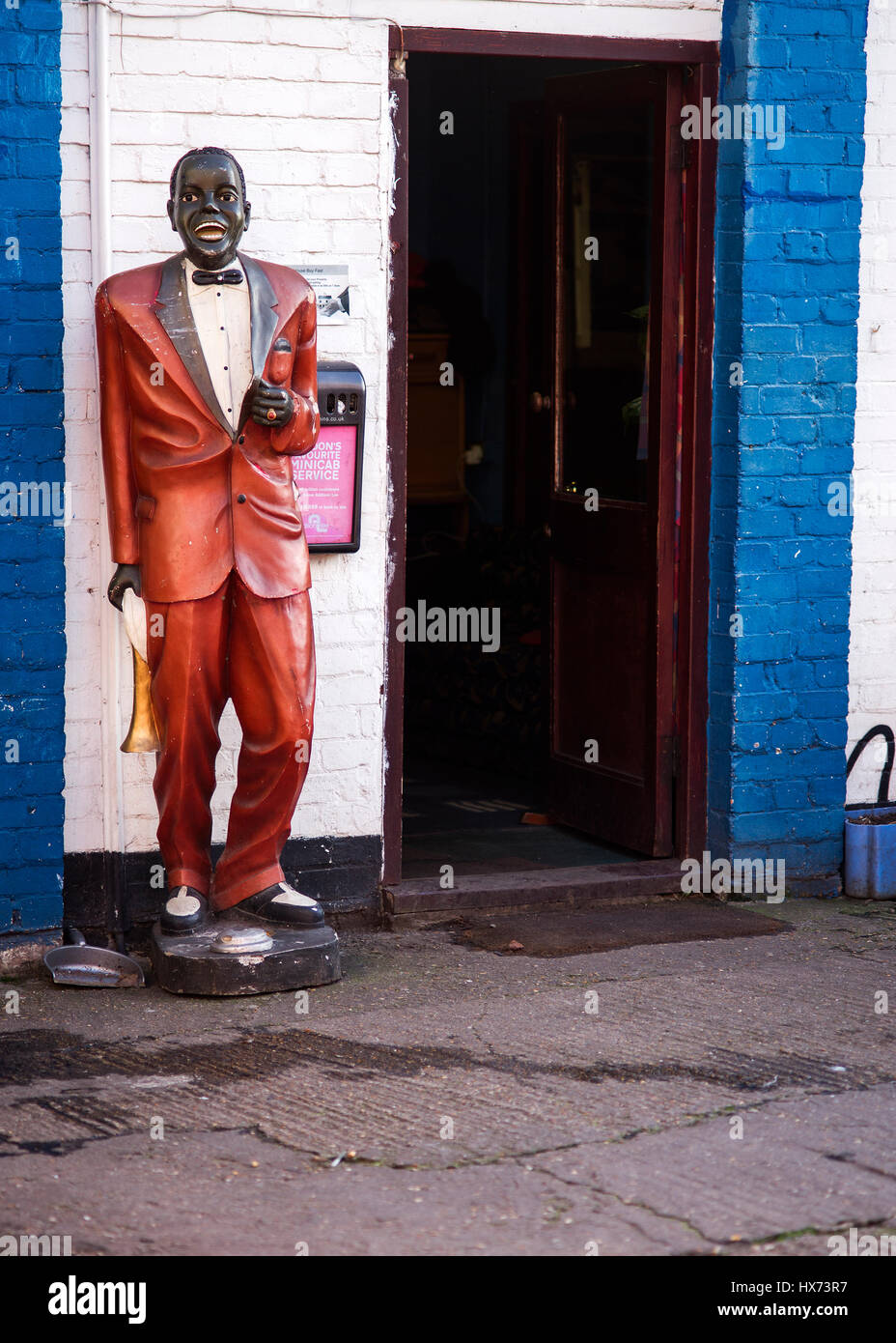 life-size cold-cast poly-resin and fibre-glass 3D model/figure of Jazz singer and trumpet player louis Armstrong Stock Photo