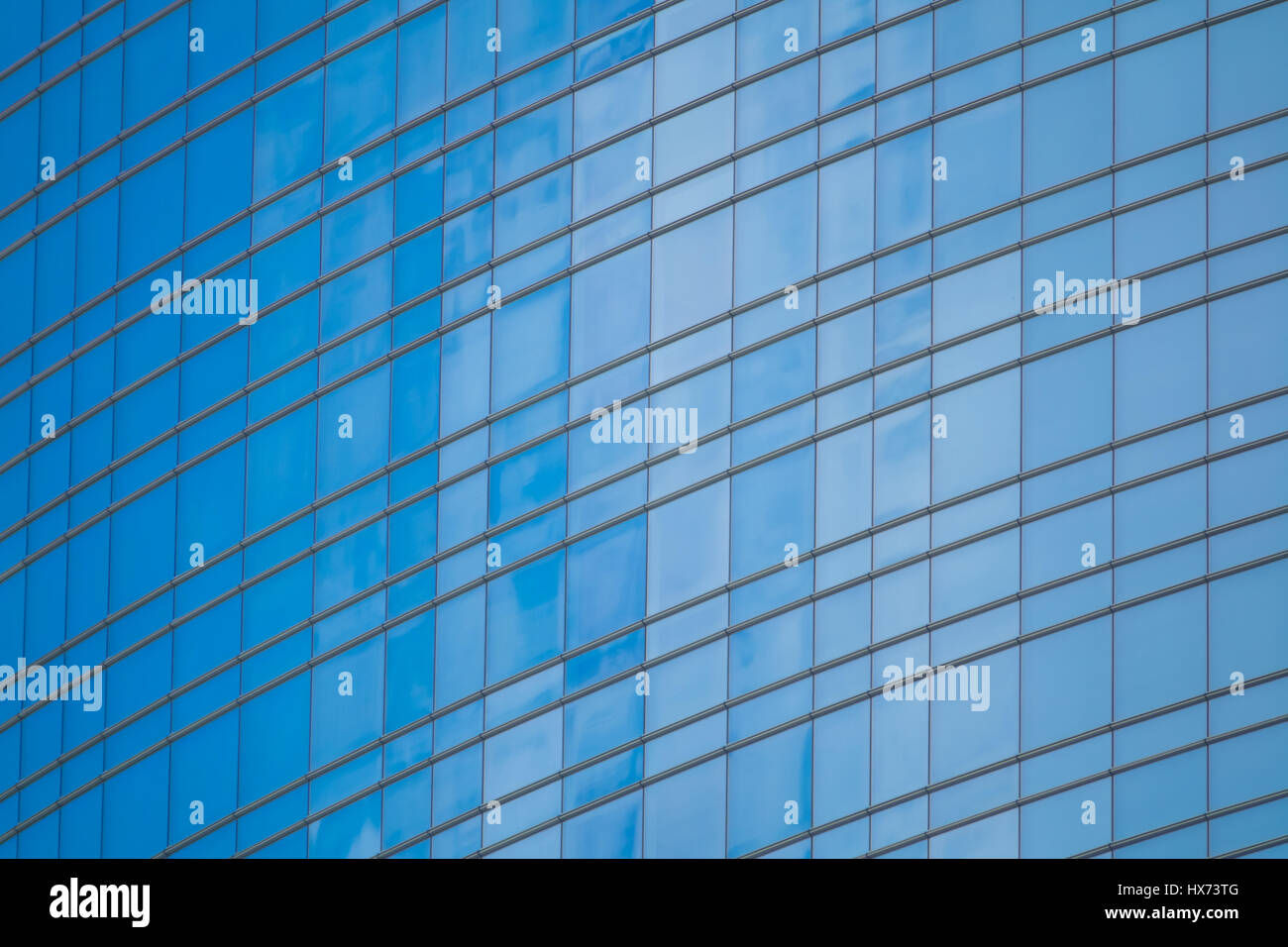 Modern office facade made from glass and steel Stock Photo - Alamy
