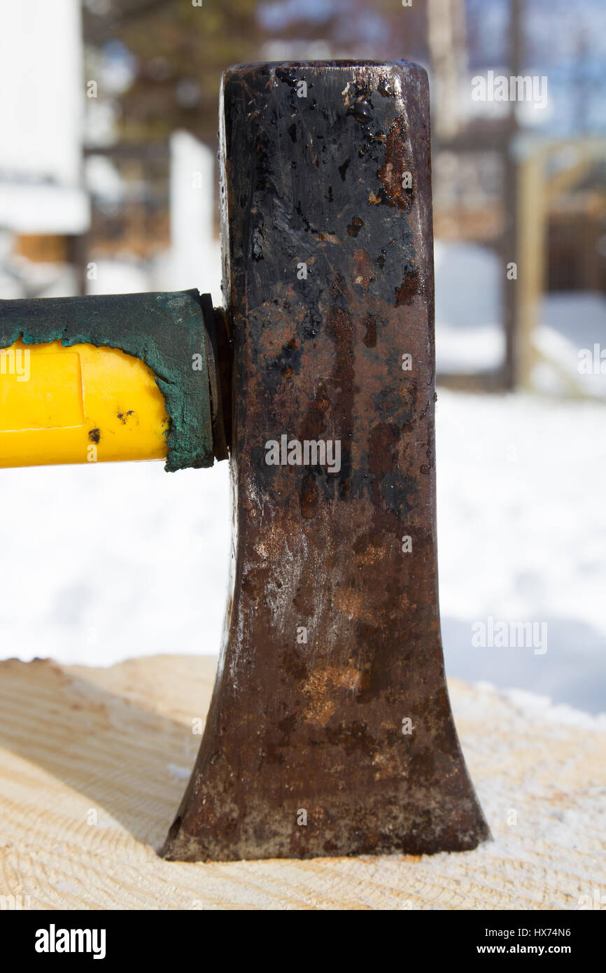 Splitting a big log of firewood for the Yukon winter with a proper ...