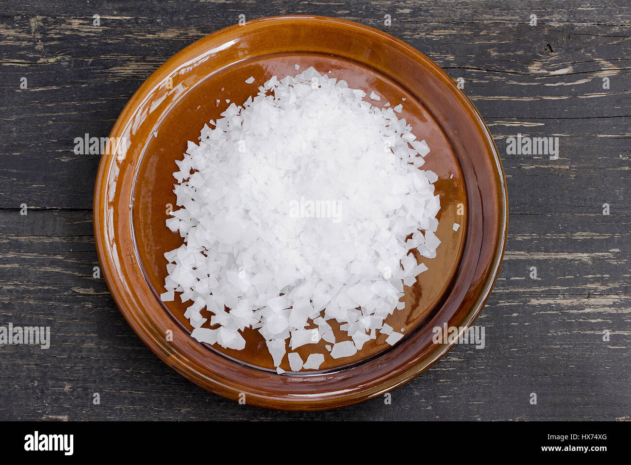 Magnesium chloride flakes, full saucer Stock Photo