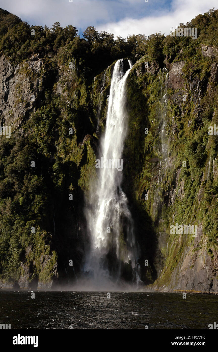 A beautiful waterfall in the Milford Sound. Stock Photo