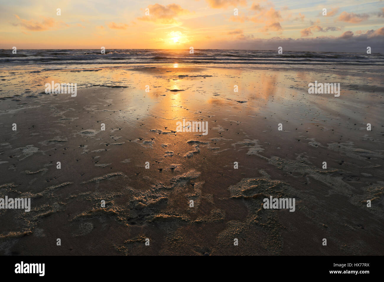 sunset at the Dutch North Sea coast Stock Photo