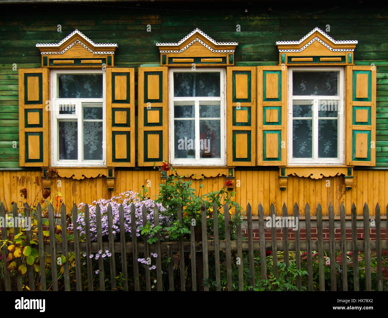 A traditional Russian house, made of wood or timbers and with ...