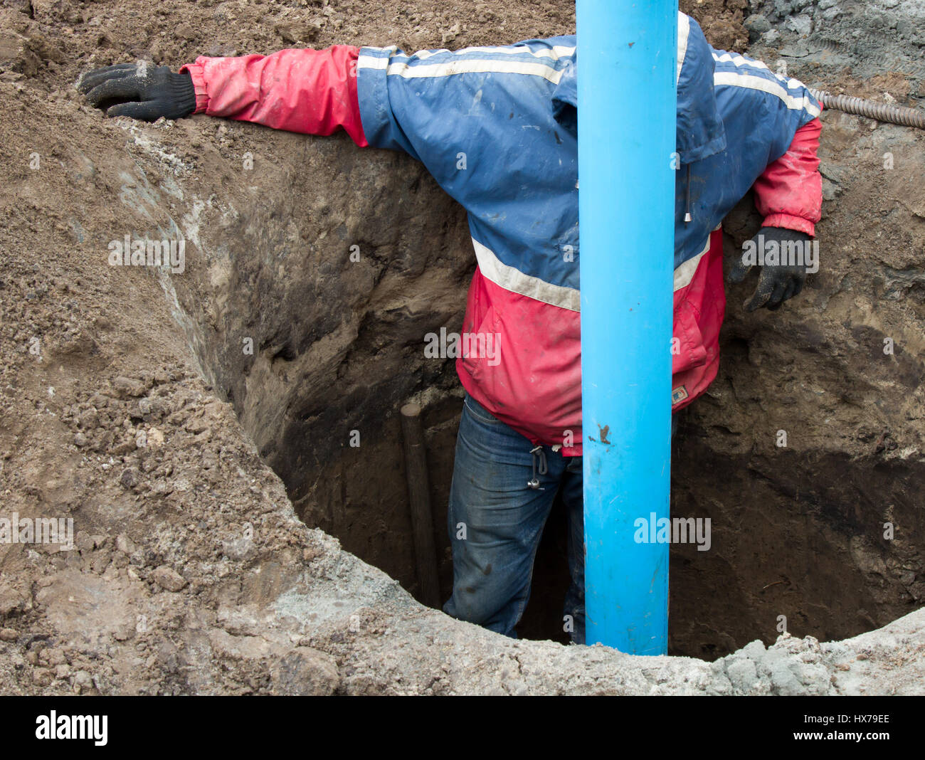 Large plastic pipe sticking out of the ground Stock Photo Alamy