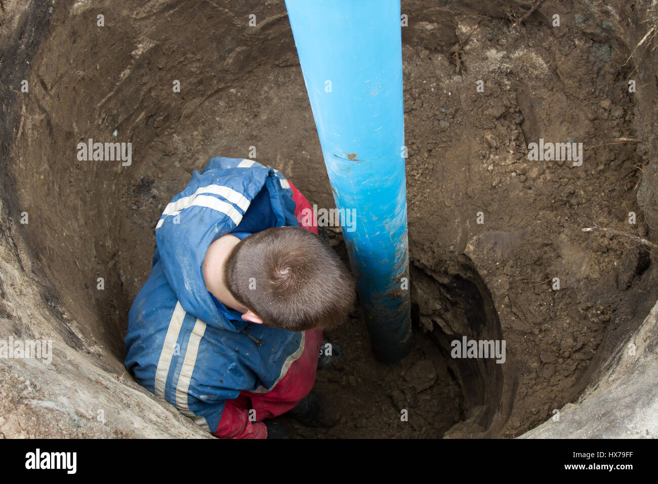 Large plastic pipe sticking out of the ground Stock Photo Alamy