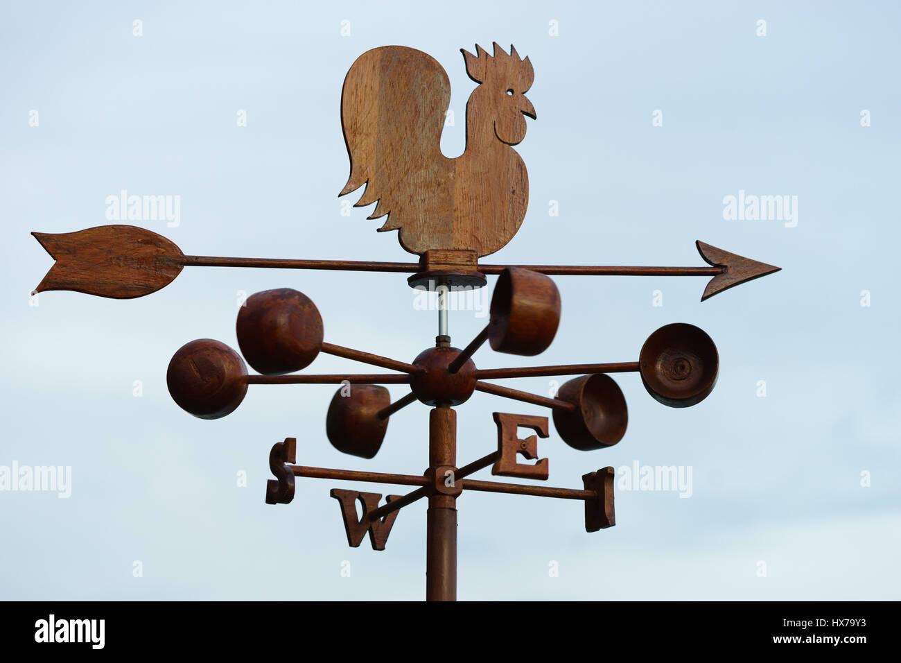Chicken wind vane with compass and sky Stock Photo - Alamy
