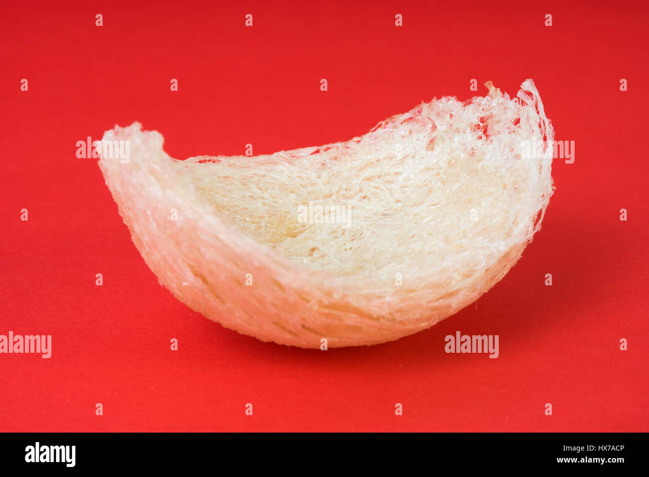 Fresh edible bird's nest on red paper Stock Photo Alamy