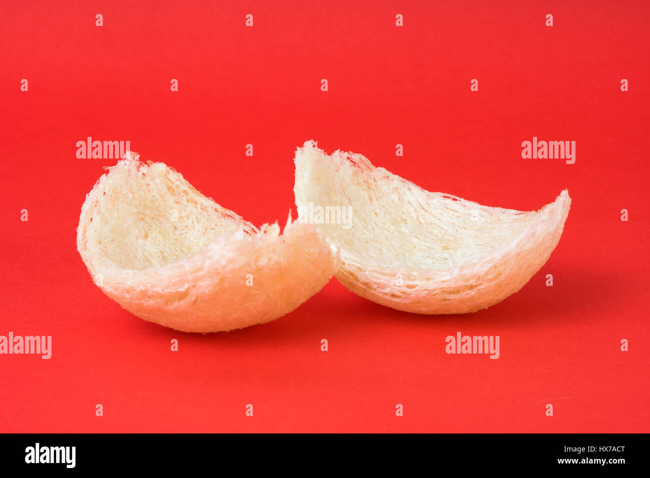 Fresh edible bird's nest on red paper Stock Photo Alamy
