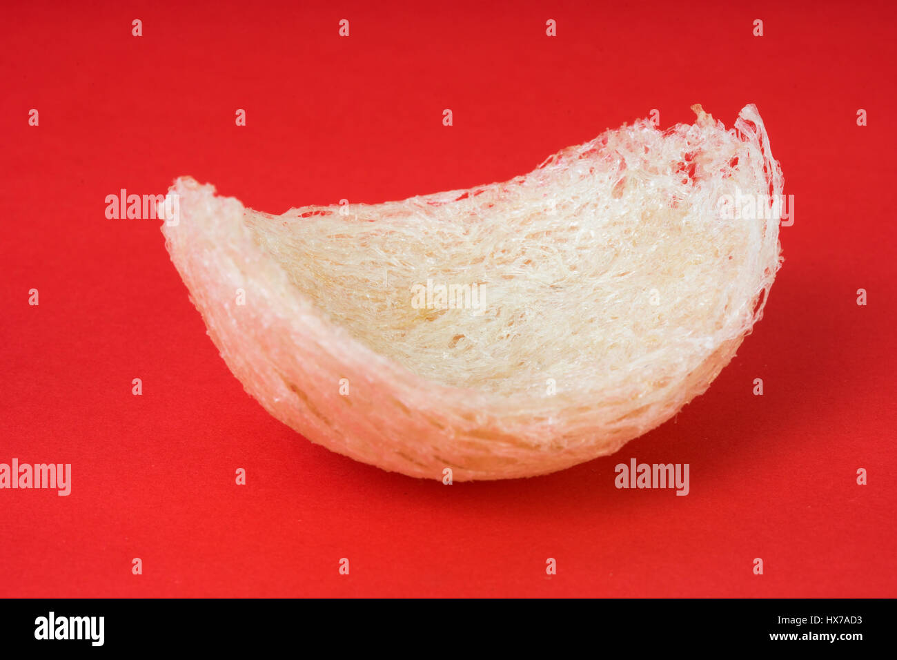 Fresh edible bird's nest on red paper Stock Photo Alamy