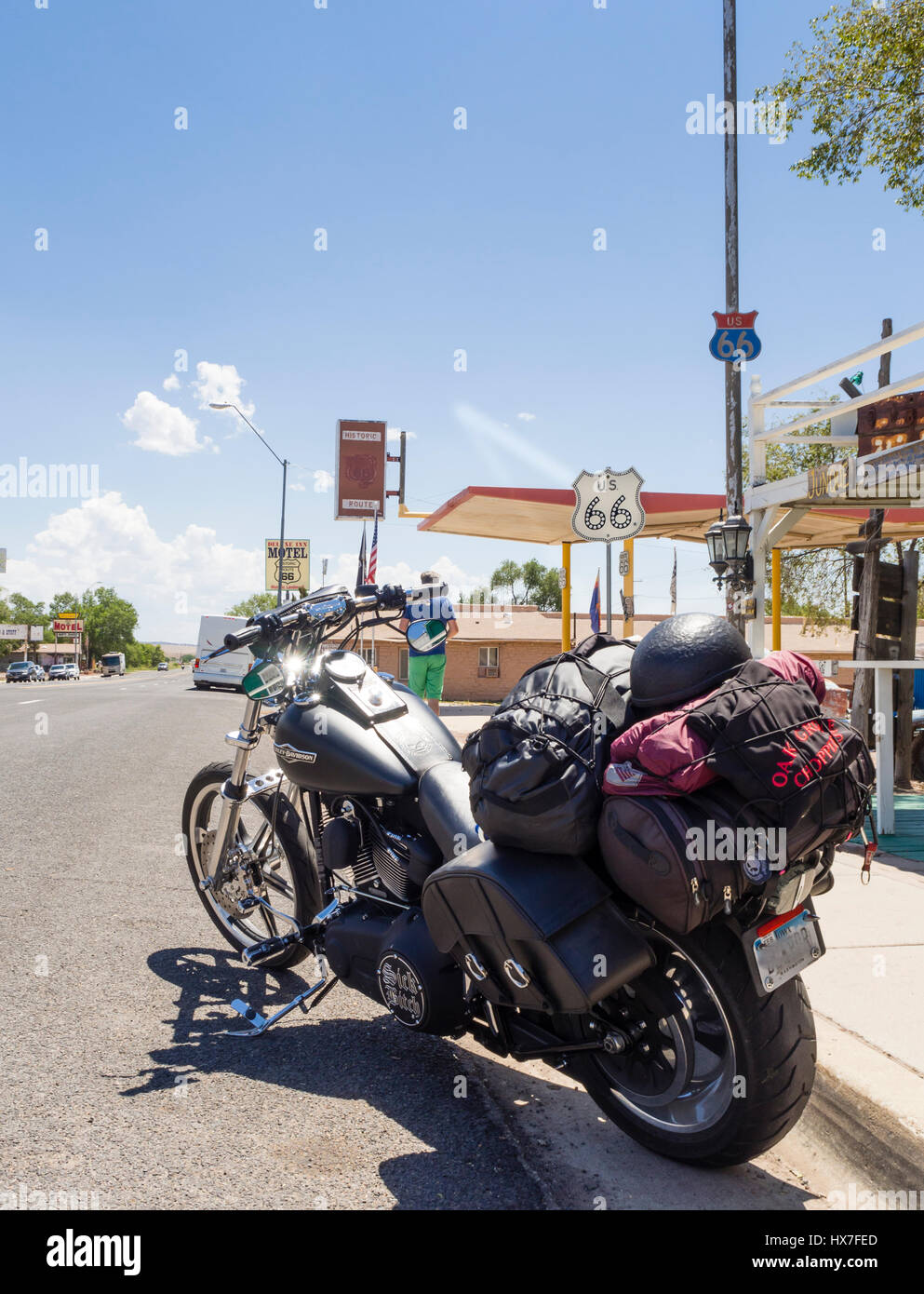 Seligman, AZ - 27 July 2016: A loaded motorcycle parked outside a gas station in Seligman (AZ) at the historic Route 66. Stock Photo