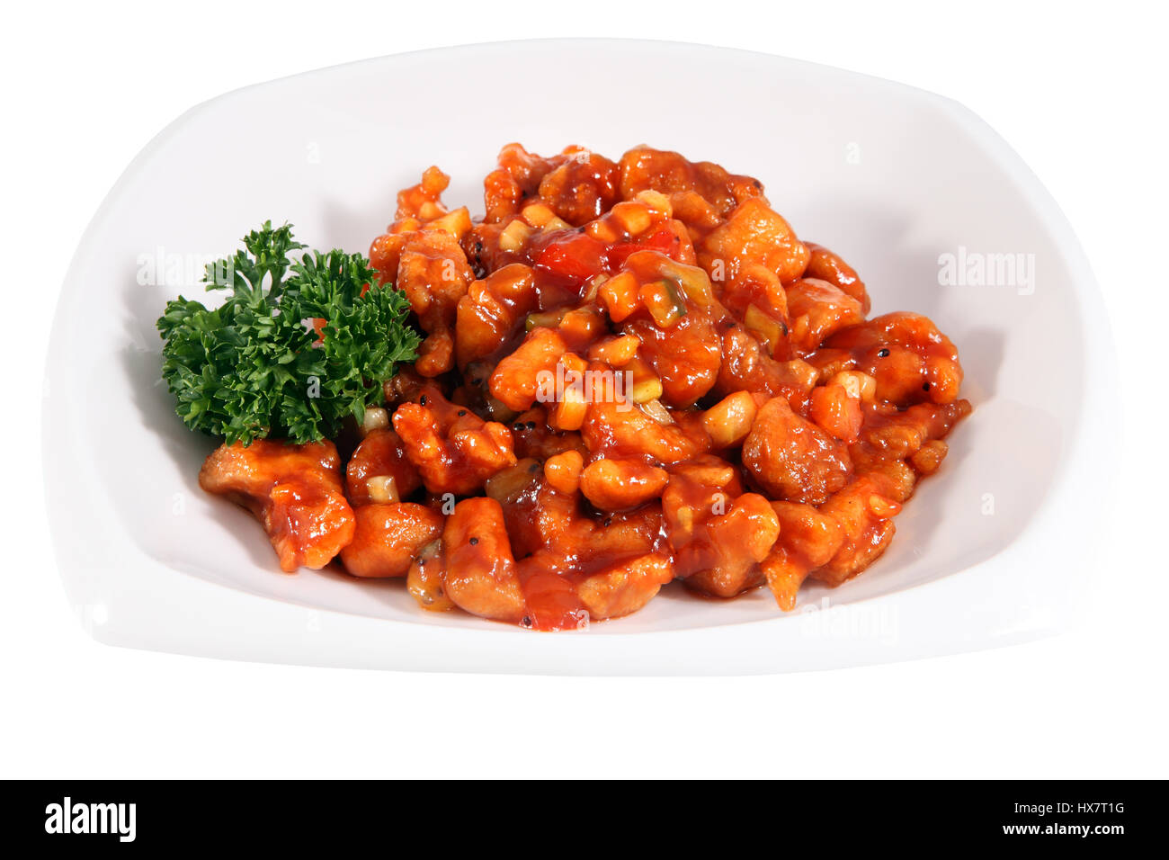 Restaurant food, Meat dish of Chinese cuisine, pork in red sweet and sour  sauce with pineapple cubes in a deep bowl, isolated on white background  Stock Photo - Alamy, image size:1300x956
