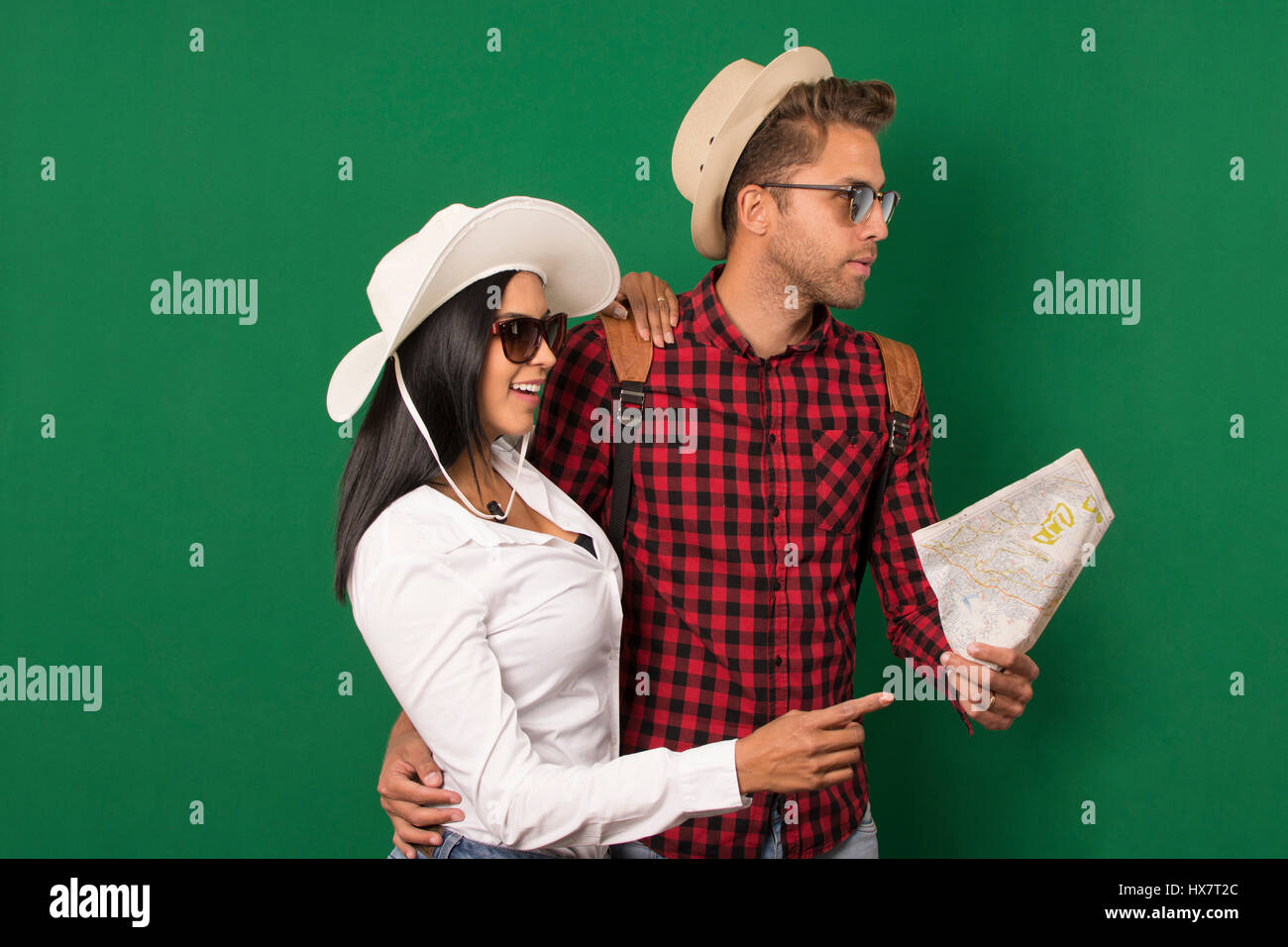 beauty couple having nice trip following map Stock Photo