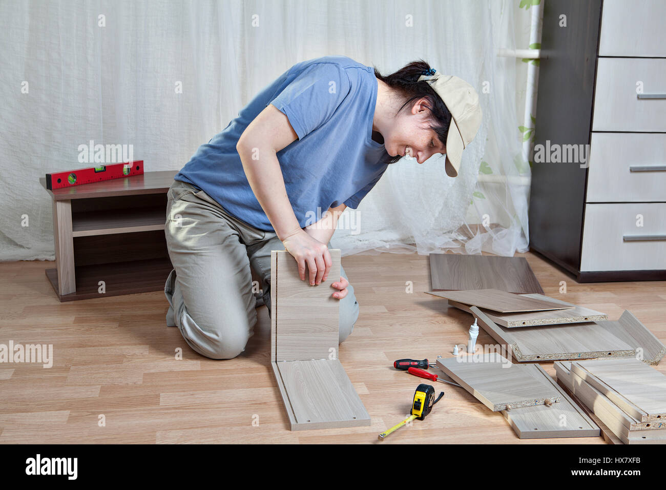 Woman nightstand assembly, bonding parts of the drawer, putting