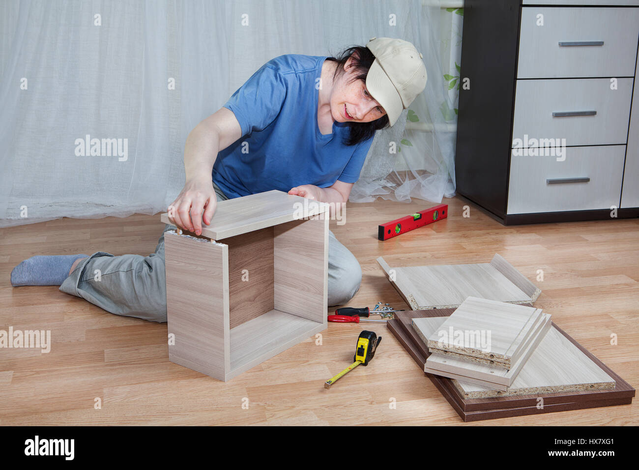 Assembling drawer bedside table hi-res stock photography and images - Alamy