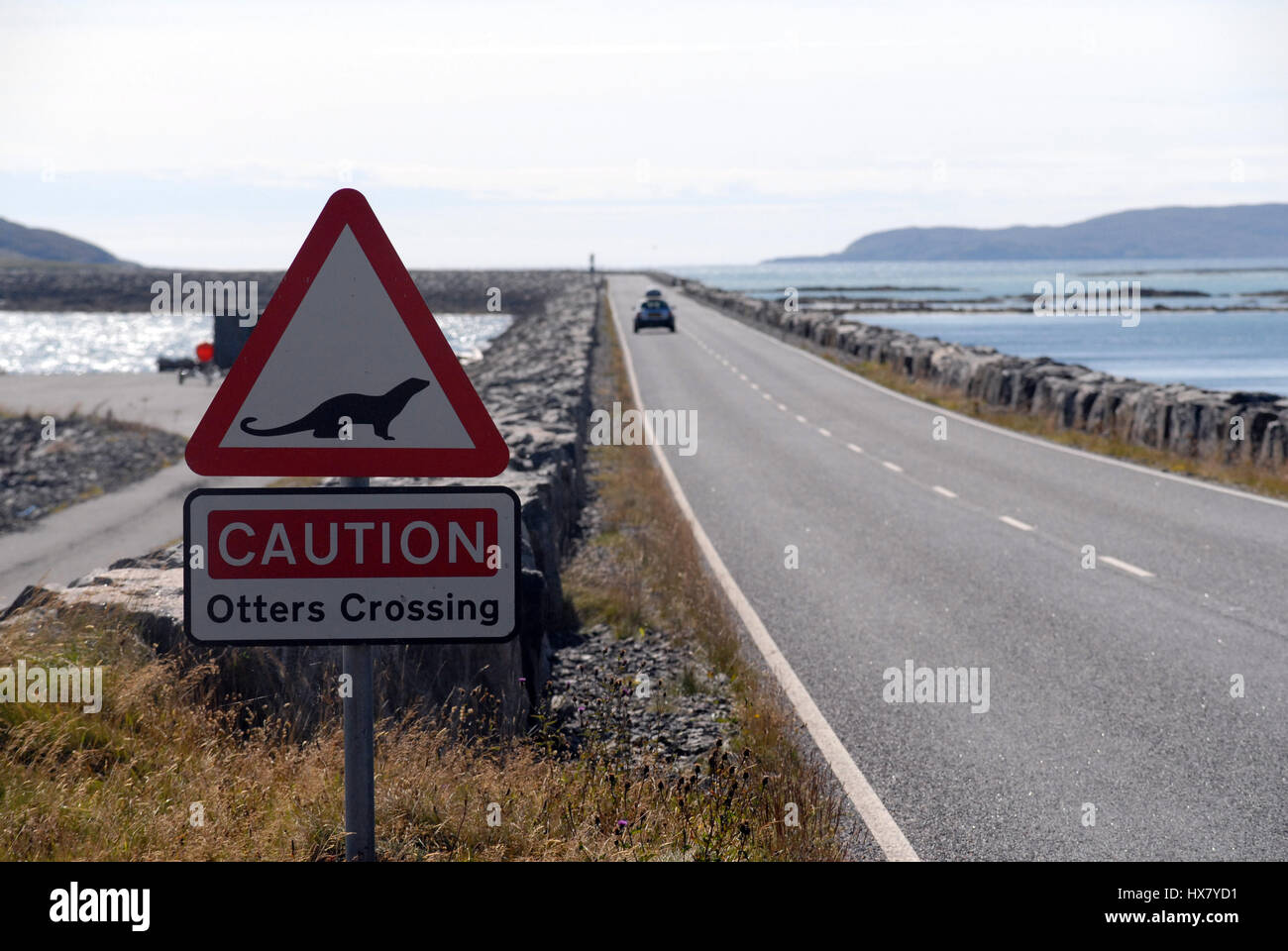 Otters Crossing Sign on a causeway, South Uist, Outer Hebrides, Scotland Stock Photo