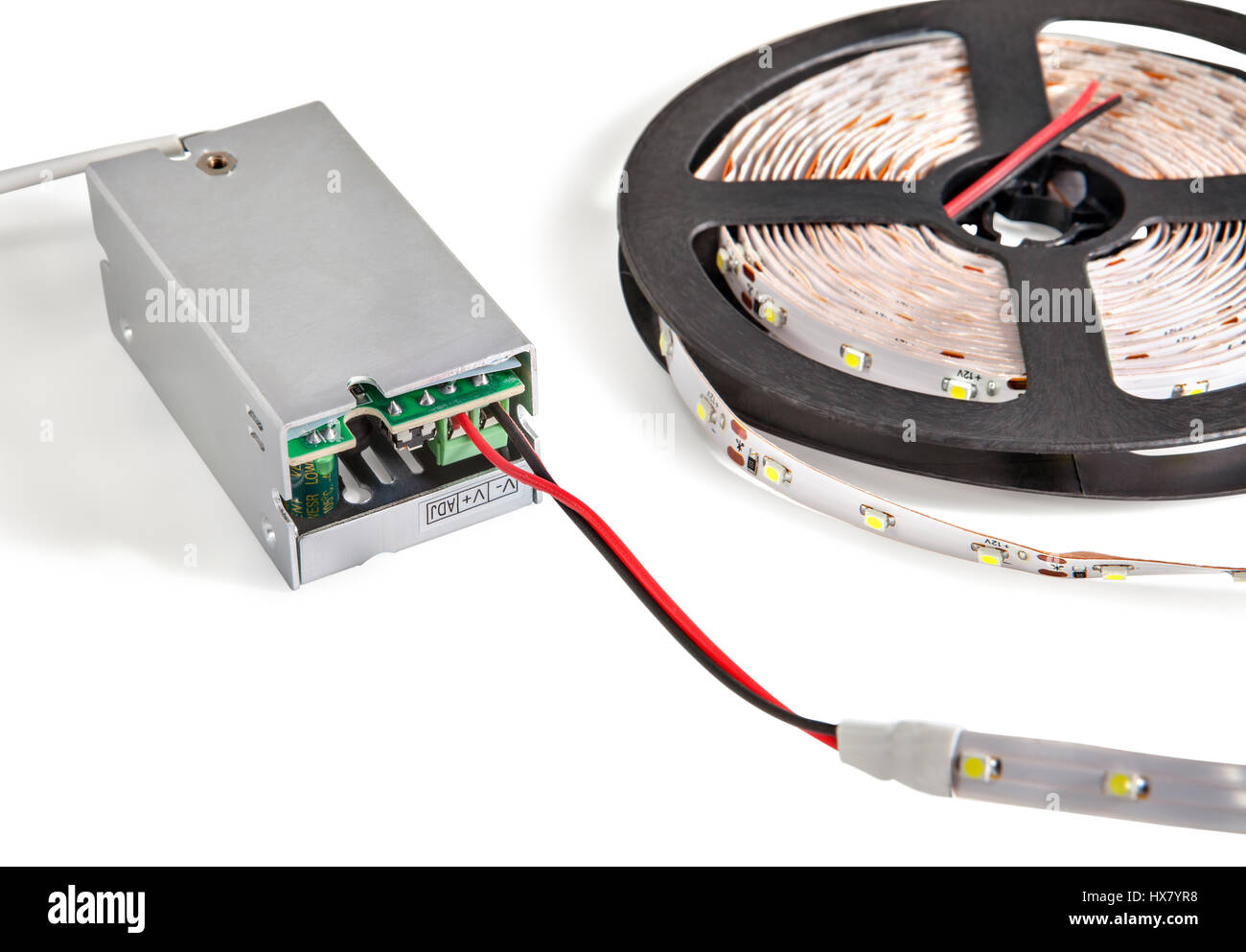 A closeup of the led Strip on plastic spool attached to current ...