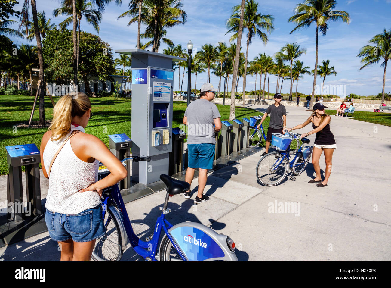 Miami Beach Florida,Lummus Park,Citi Bike,bicycle sharing program,station,bike,woman female women,man men male,couple,FL170221004 Stock Photo