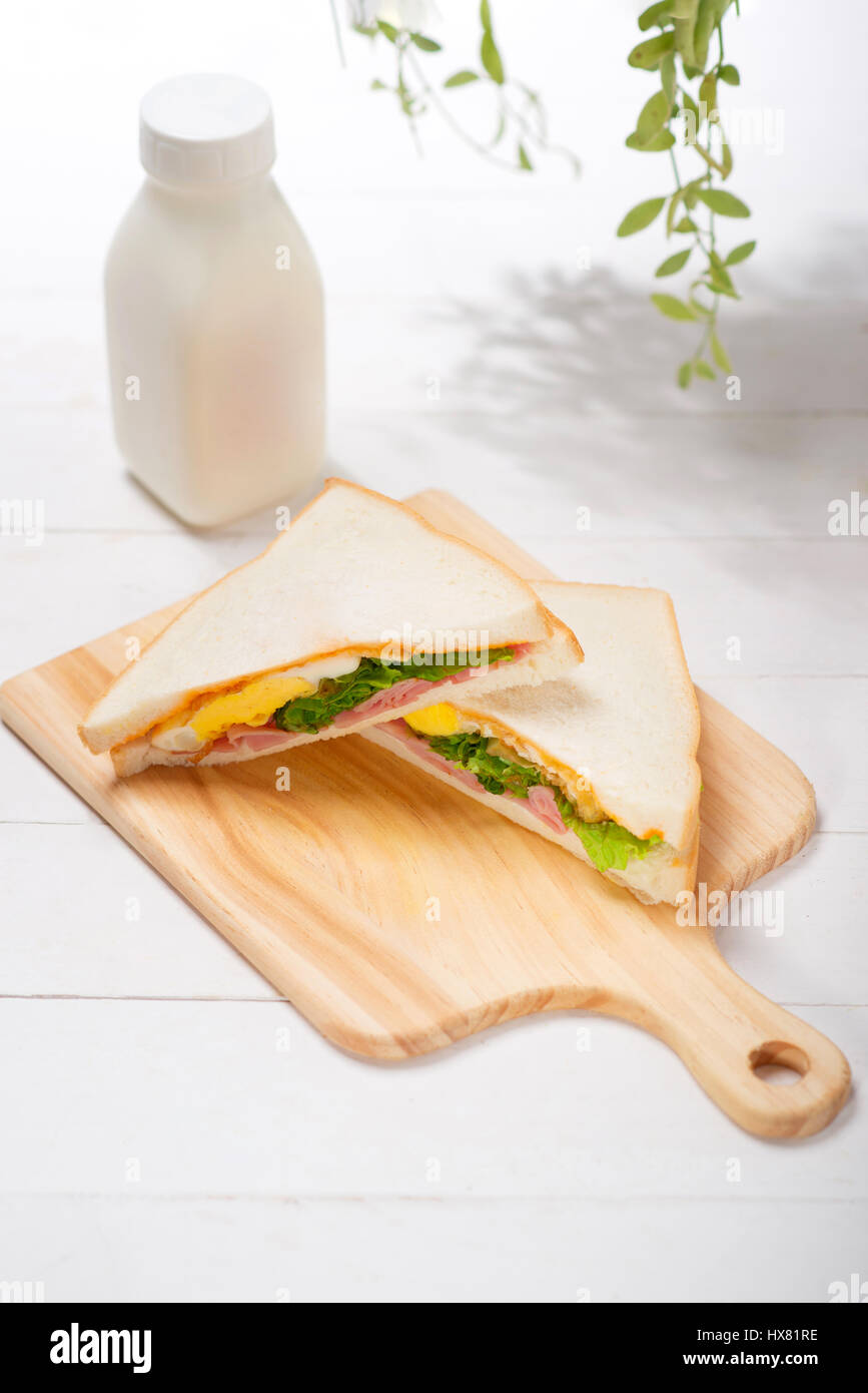 Lunch meal with milk, orange juice and sandwiches Stock Photo Alamy