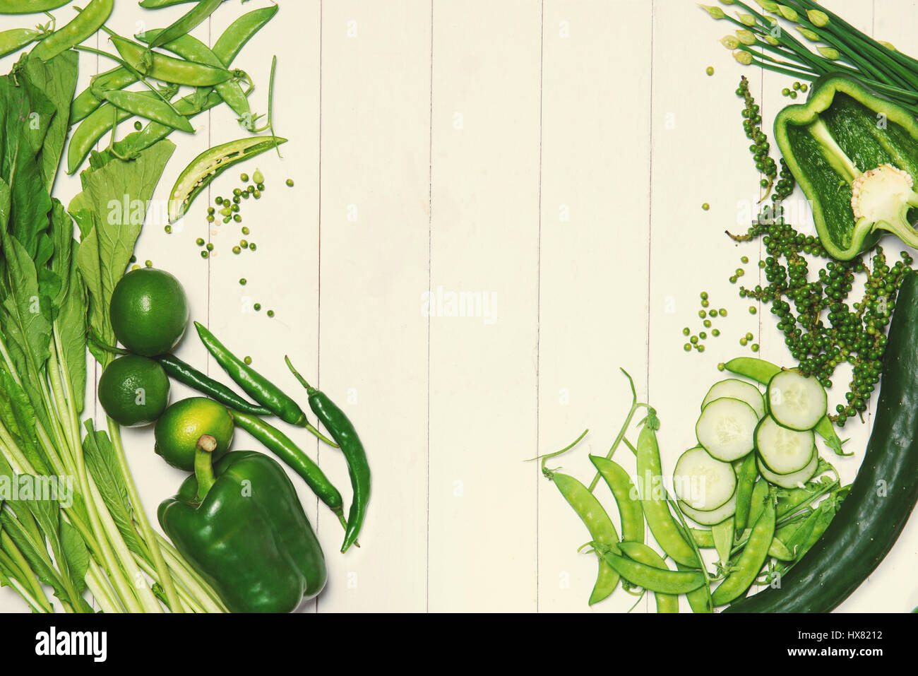 Fresh green vegetables on a white background Stock Photo - Alamy