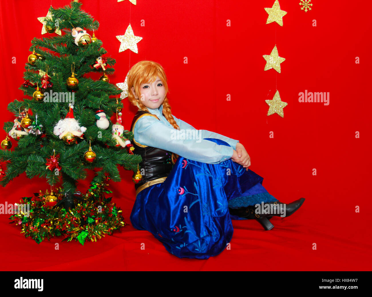 Bangkok - Dec 28: An unidentified Japanese anime cosplay pose in COSCOM ...