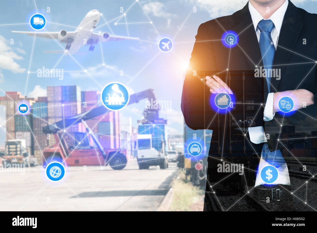 Double exposure businessman standing with his arms crossed with global business logistics system connection technology interface global partner connec Stock Photo