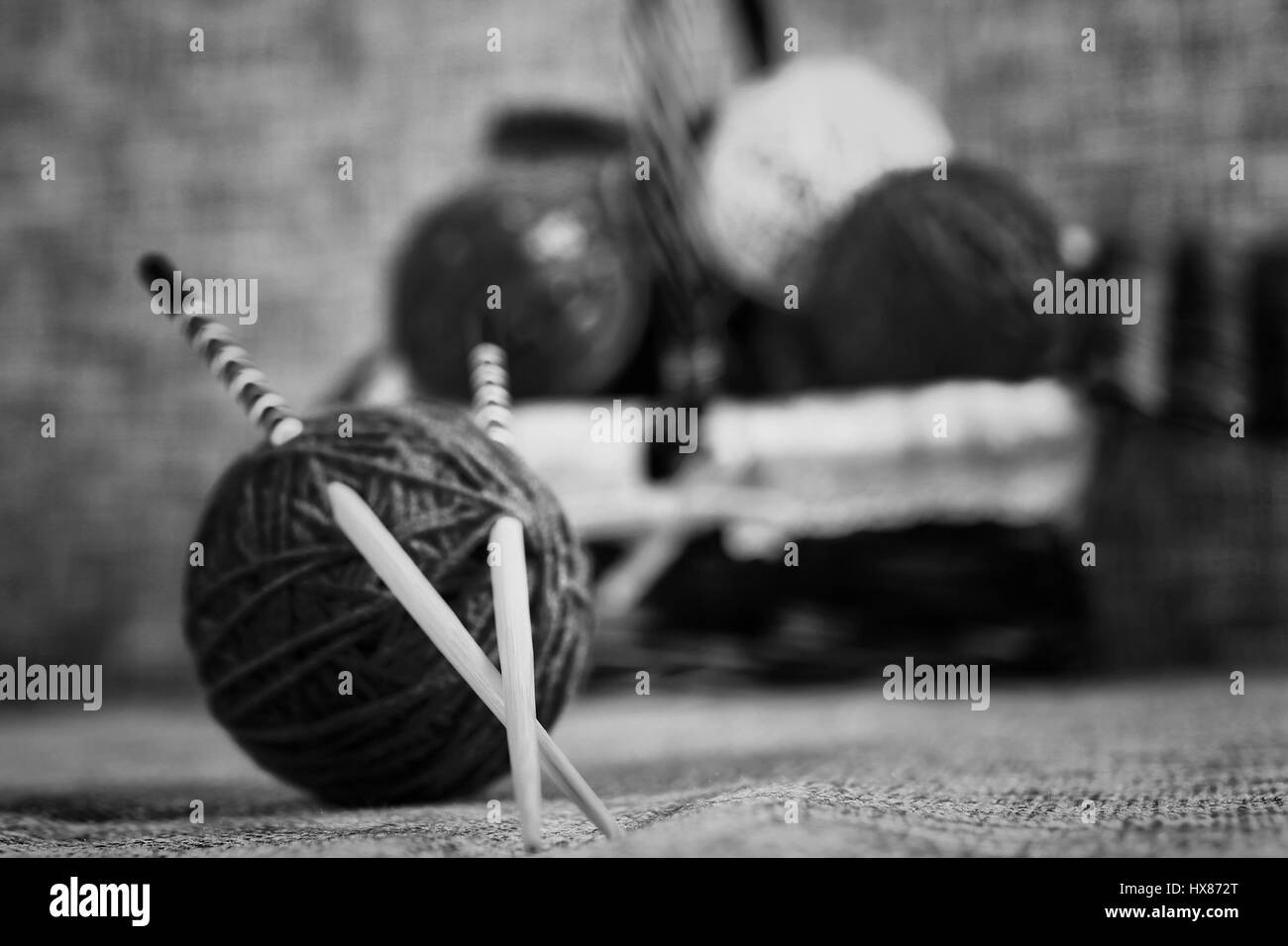 embroidery wool balls and knitting needles Stock Photo Alamy