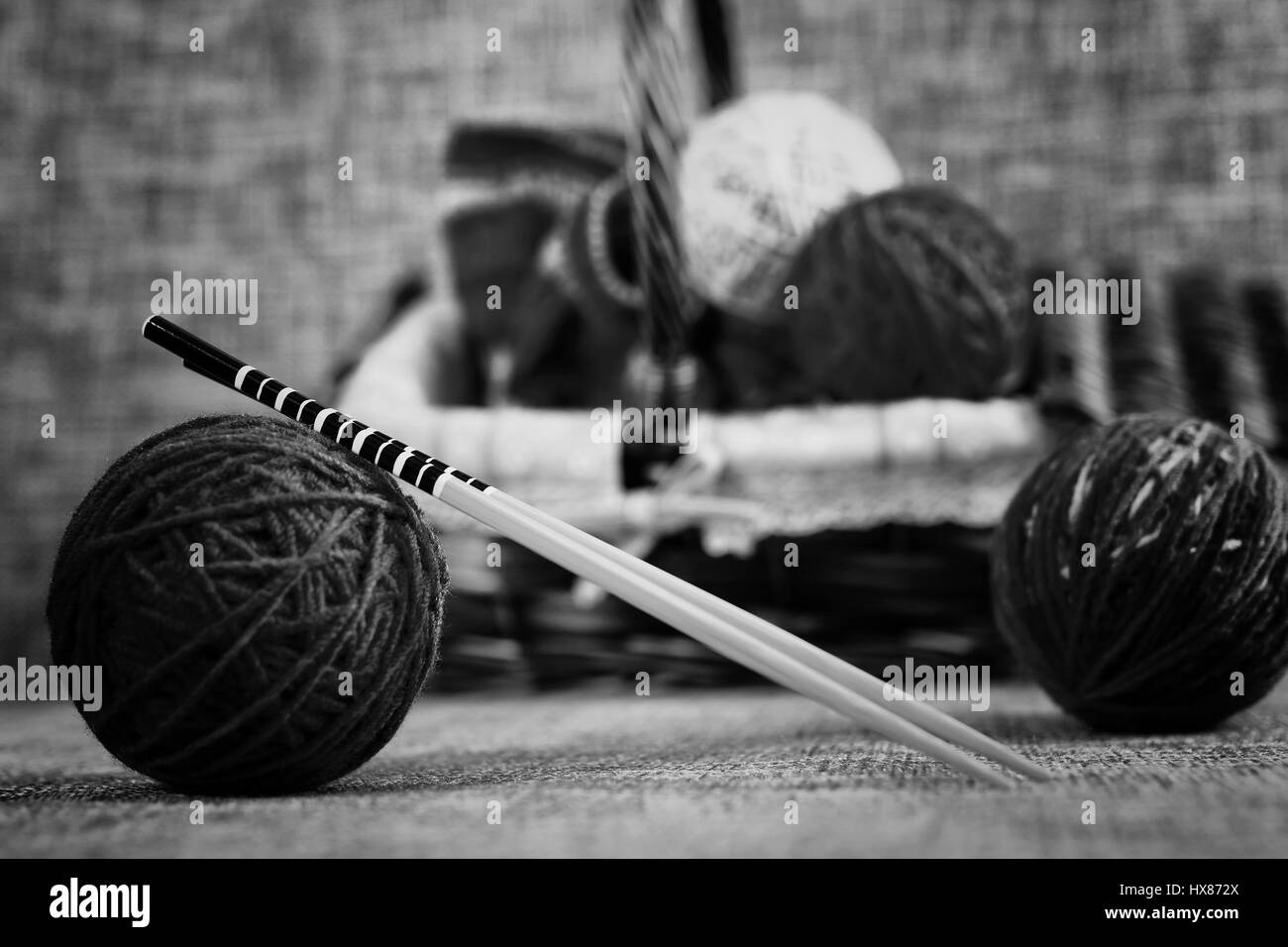 embroidery wool balls and knitting needles Stock Photo Alamy