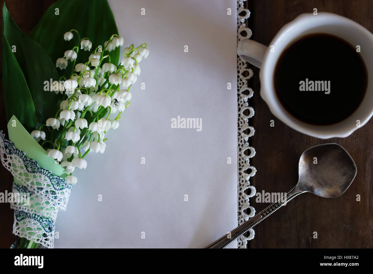 Bouquet Of Lilies Of The Valley And Morning Coffee Stock Photo