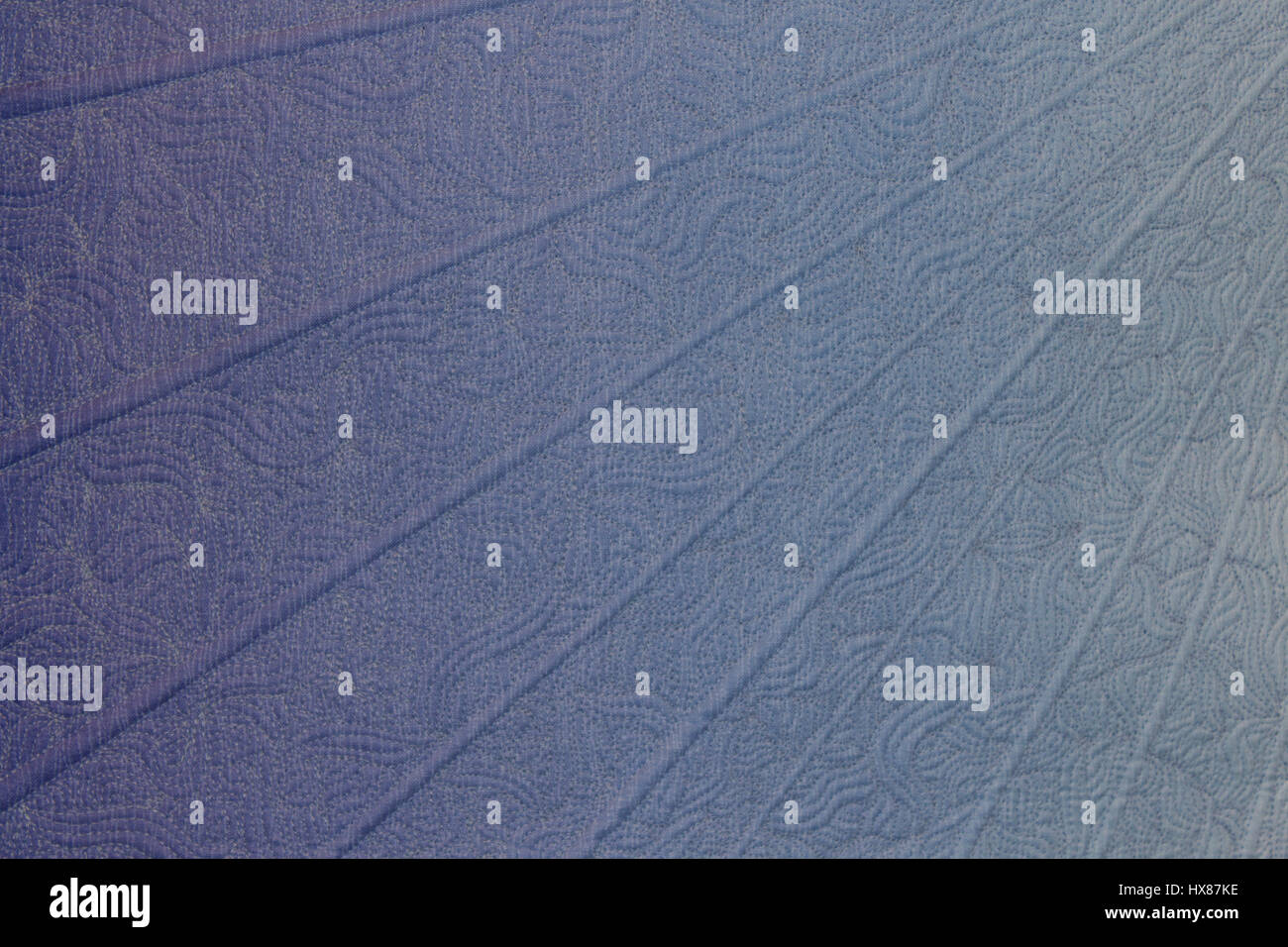 Portion of quilted blue banner Stock Photo