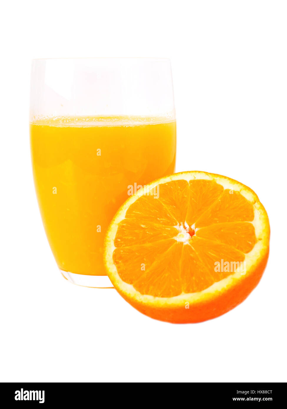 Glass of fresh orange juice and half of orange fruit isolated on white